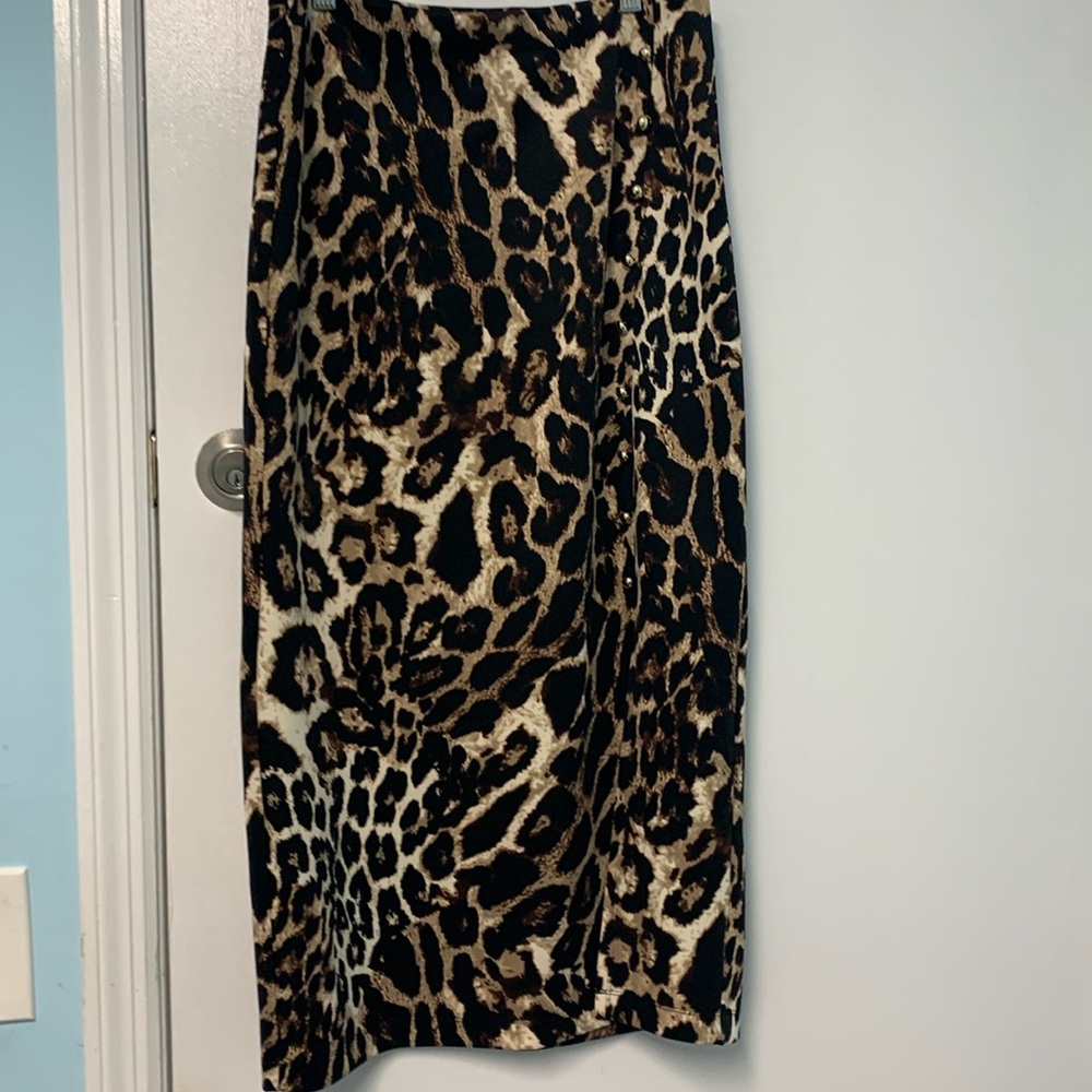 Nycc leopard cheetah or jaguar print size small with gold buttons skirt used